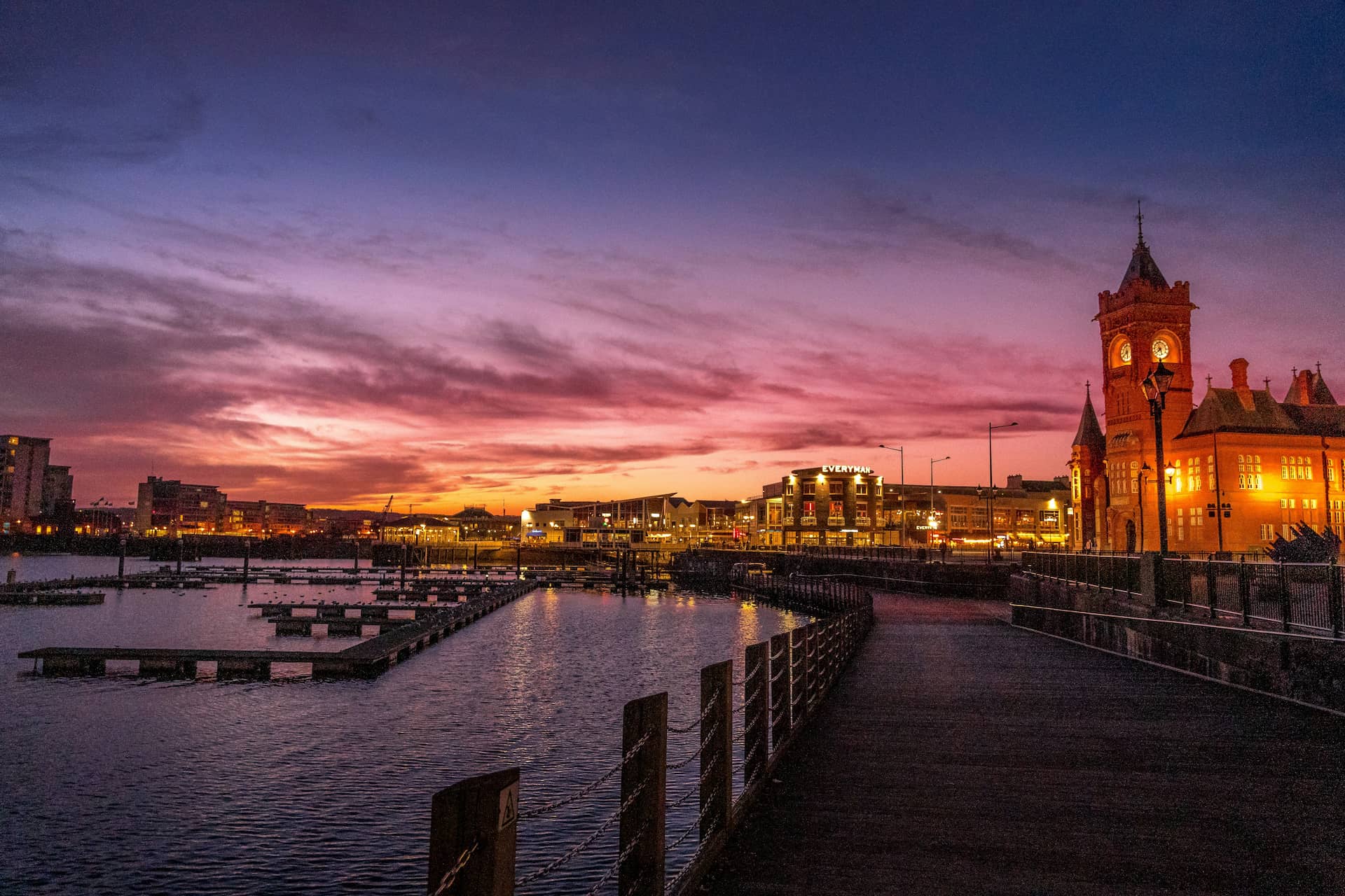 Cardiff Bay at sunset with the Pierhead Building, home to Christmas party venues