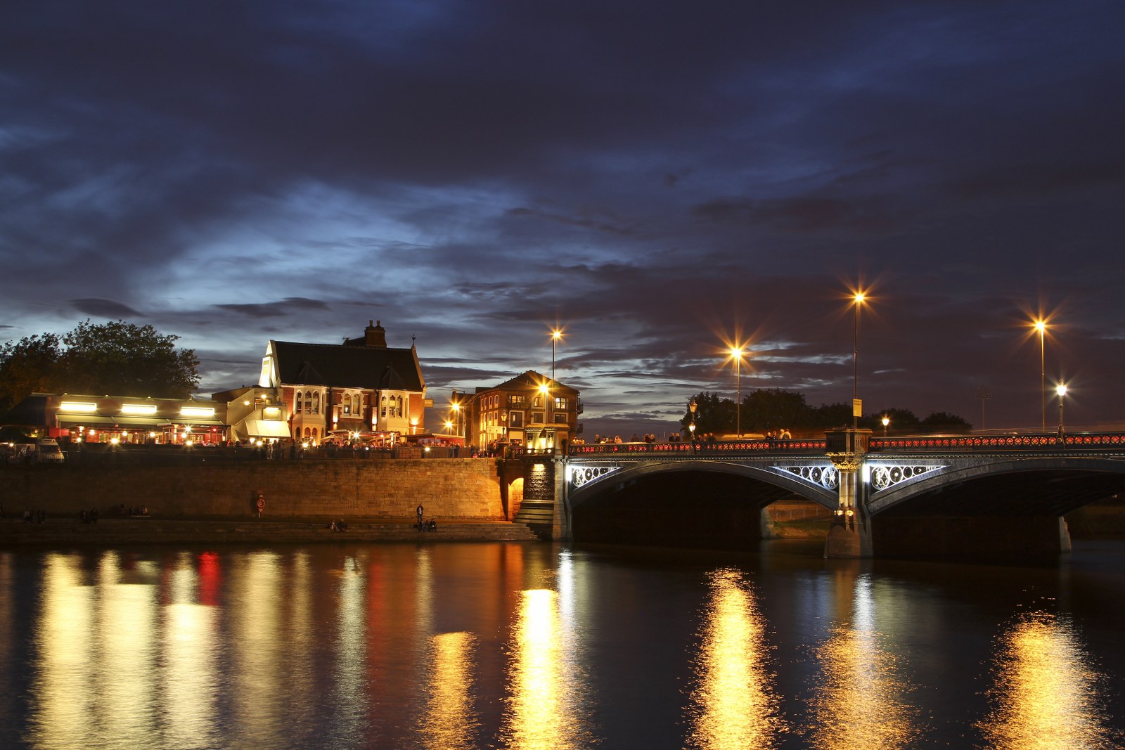 Trent Bridge over the River Trent in Nottingham at night, home to Christmas party venues