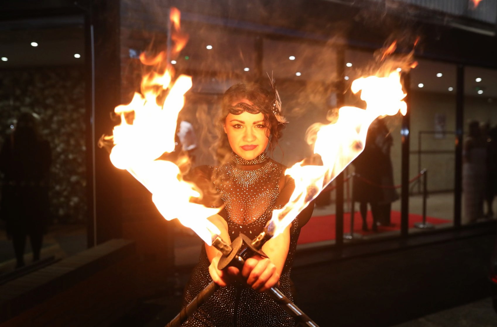 Fire performer in Winter Masquerade costume at Moonlight & Mistletoe, ICB Wolverhampton